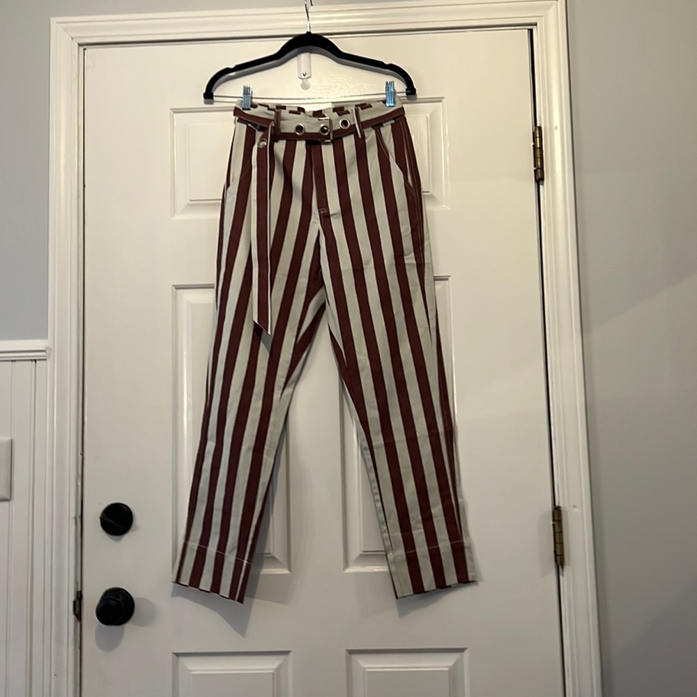 uniq pants cream, and maroon stripes